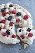 Pavlova with berries and nuts