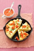 Potato tortilla with feta and roasted pepper sauce
