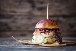 A burger with halloumi and cabbage