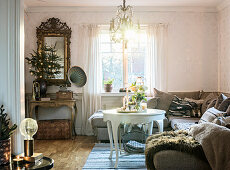 Festively decorated living room in shades of brown and white