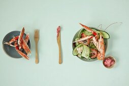 Cucumber and rhubarb salad with langoustines and beetroot butter
