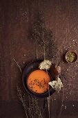 Sweet potato soup with coconut milk and pumpkin seeds