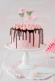 A pink girl's cake for a children's party