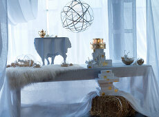 White Christmas decorations on long dining table