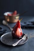 Poached pear in port wine with spices