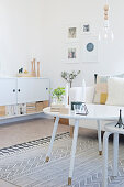 White furniture in Scandinavian-style living room