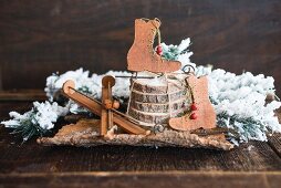 Christmas arrangement of ice-skate and ski decorations