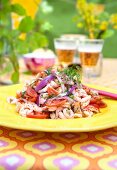 Salad with shrimps, crawfish, tomatoes, red onion and dill