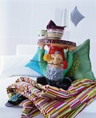 Garden-gnome side table and patterned home accessories