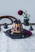 A gugelhupf with teff flour, chickpea flour, blueberries, blackberries, cashews, maple syrup and blueberry powder