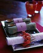 Rolled linen napkins with original napkin rings