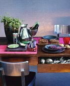 An autumnal table set with vegetables and bread