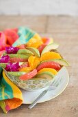 Avocado salad with orange and pink grapefruit wedges