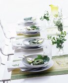 Table settings with herb cheese and pears