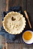 How to make a meat pie with 'Pie' lettering and a dough heart