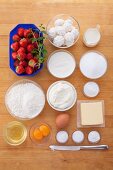 Ingredients for cupcakes with strawberry mascarpone cream