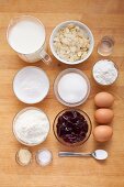 Ingredients for quick cream biscuit slices with almond flakes