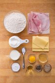 Ingredients for stuffed ham and cheese croissants made from quark oil dough