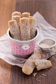 Macadamia and cinnamon biscuits with icing sugar