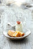 Meatloaf-filled potato dumplings served with cabbage slaw