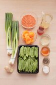 Ingredients for a lentil salad with apricots and sugar snap peas