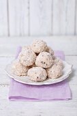 Quark balls coated in coconut on a plate
