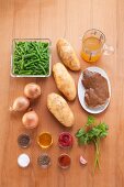 Ingredients for a dish with potatoes, beans and seitan