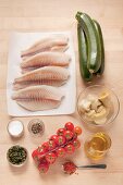 Ingredients for steamed tilapia fillet with Mediterranean vegetables
