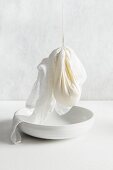 Ricotta in a muslin cloth