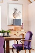 Picture of cockerel and purple upholstered dining chairs in dining room