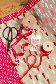 Christmas wrapping materials in shades of red