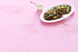 Raw broccoli and avocado salad with beetroot