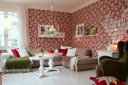 Cosy living room with red floral wallpaper