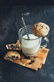 Stuffed homemade chocolate chip cookies and a glass of milk