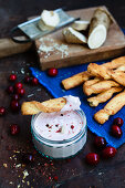 Cranberry and horseradish dip with puff pastry sticks