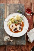 Pork fillets with plums and dumplings