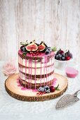 Rustic drip cake with fresh fruit