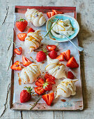 Meringues with strawberries and maple syrup lavender cream