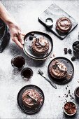 Paleo chocolate tarts with blackberries, served with coffee