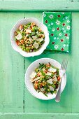 Broad bean and chickpea salad with tomatoes and parmesan