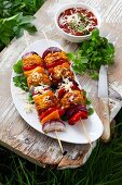 Vegetable skewers topped with grated cheese
