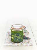 Lacto fermented green peppers in a jar