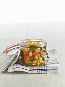 Lacto fermented mini peppers with tarragon in a mason jar