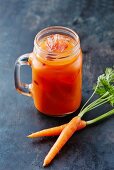 Carrot juice with ice cubes