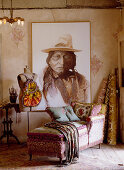 Récamier and tailors' dummy in front of large portrait of Native American