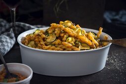 Noodles with Pesto Rosso, roasted zucchini, and seasoned yeast crumbs (vegan)