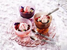 Watermelon fruit salad with ice-cream and raspberry-pepper syrup