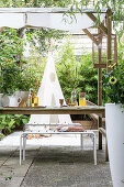 Set garden table on roofed terrace