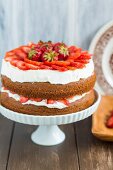 Strawberry shortcake on a cake stand