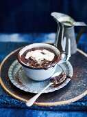 Hot chocolate puddings with vanilla sauce